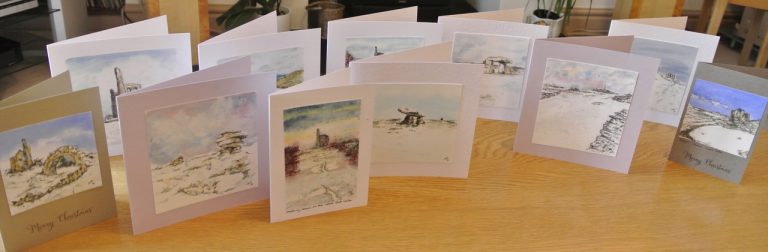 A selection of Christmas cards using original watercolour sketches